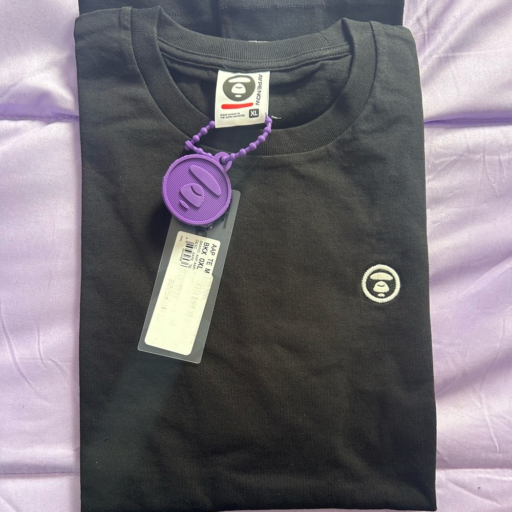 Brand new BAPE T-shirt. Comes with tags and original packaging !!